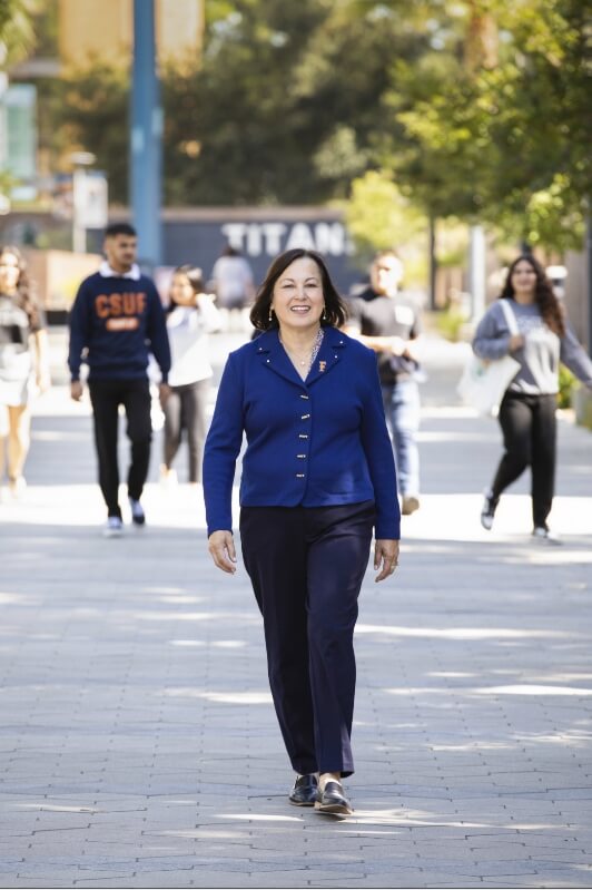 President Alva walks down Titan Promenade