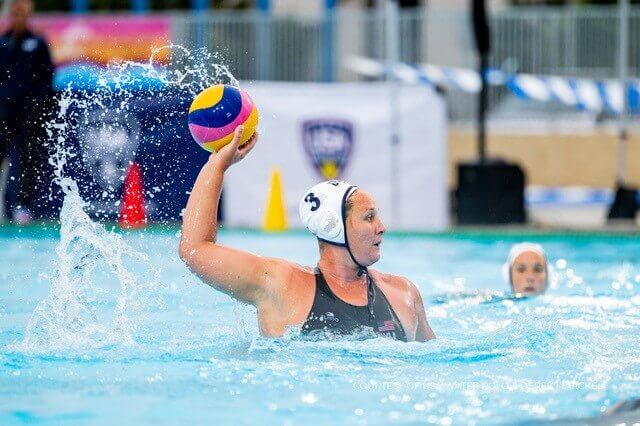 Melissa Seidemann in pool playing water polo